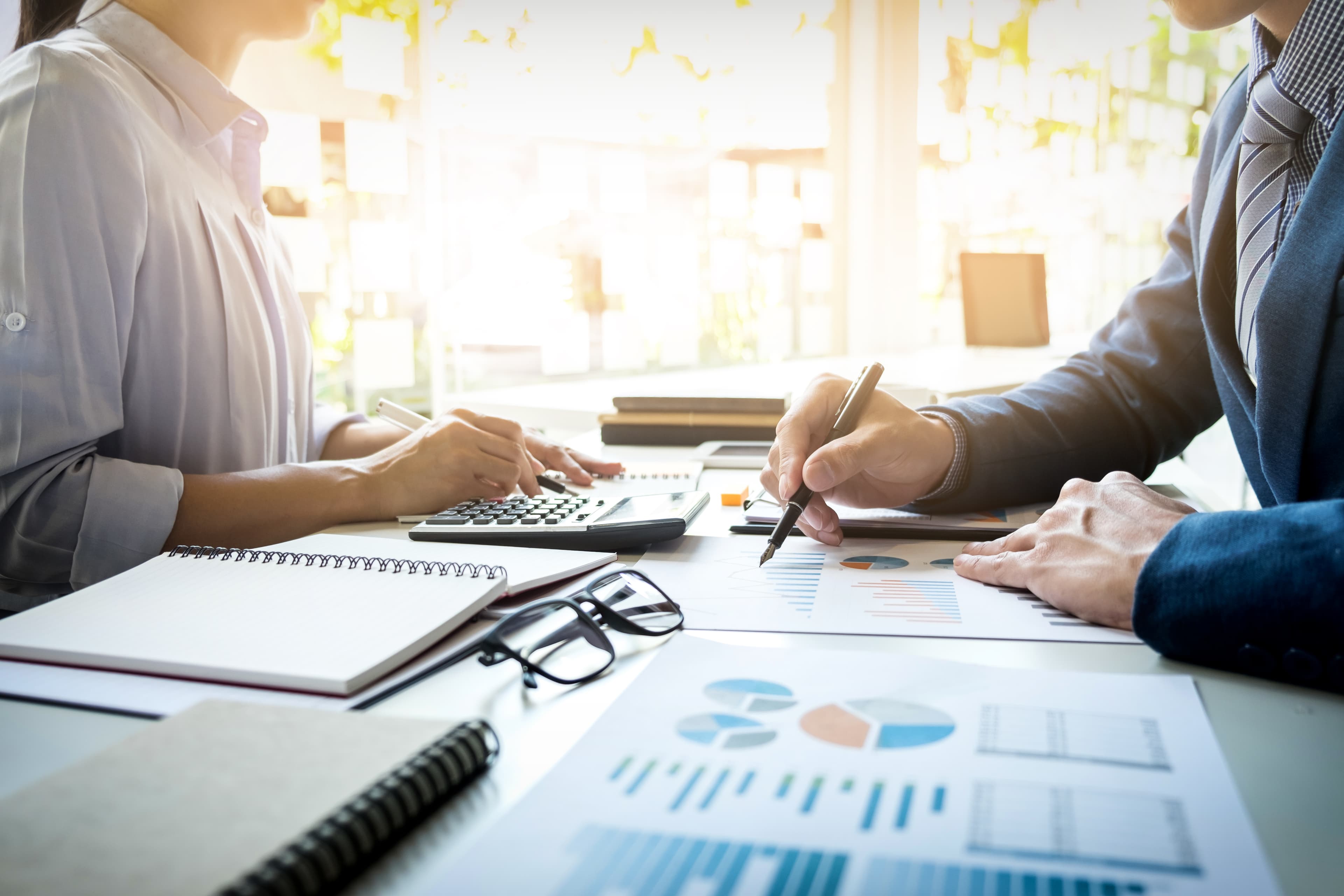 Financial documents being reviewed at a consultation